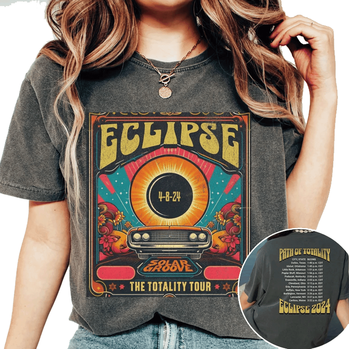a woman wearing a black eclipse t - shirt